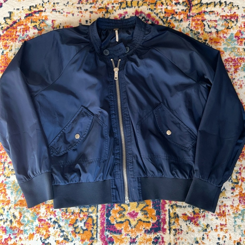 Very nice free people blue medium bomber style jacket , light .